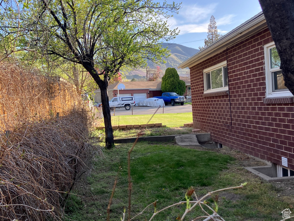 View of yard with a mountain view