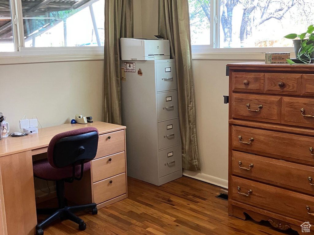 Office space with wood finished floors