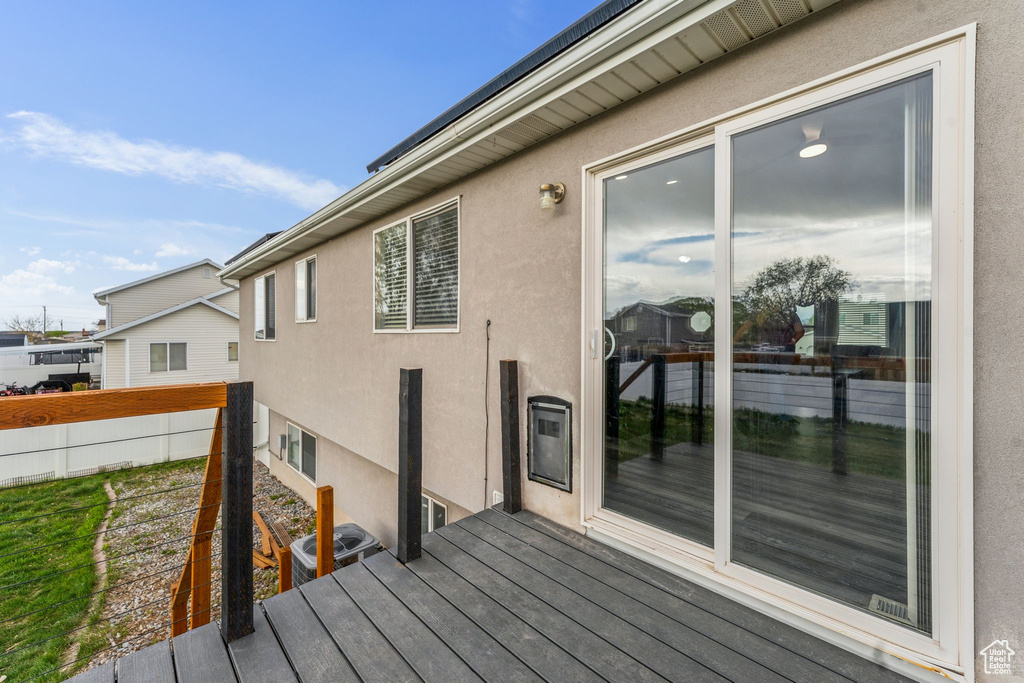 Wooden deck featuring fence