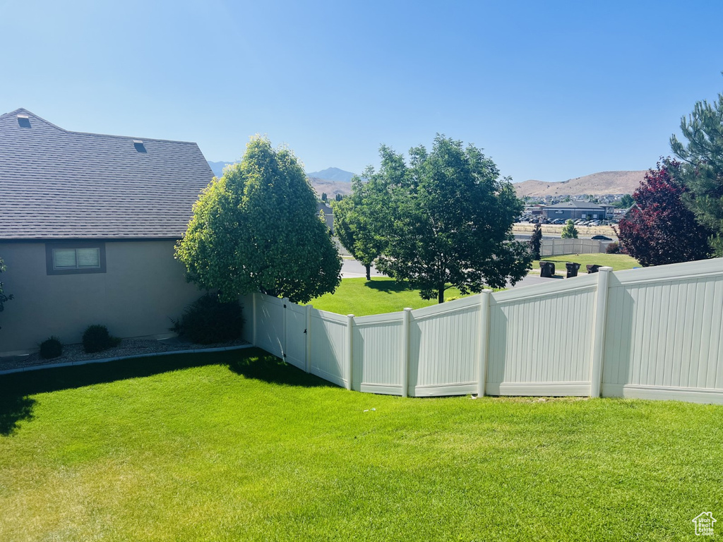 View of yard with a mountain view