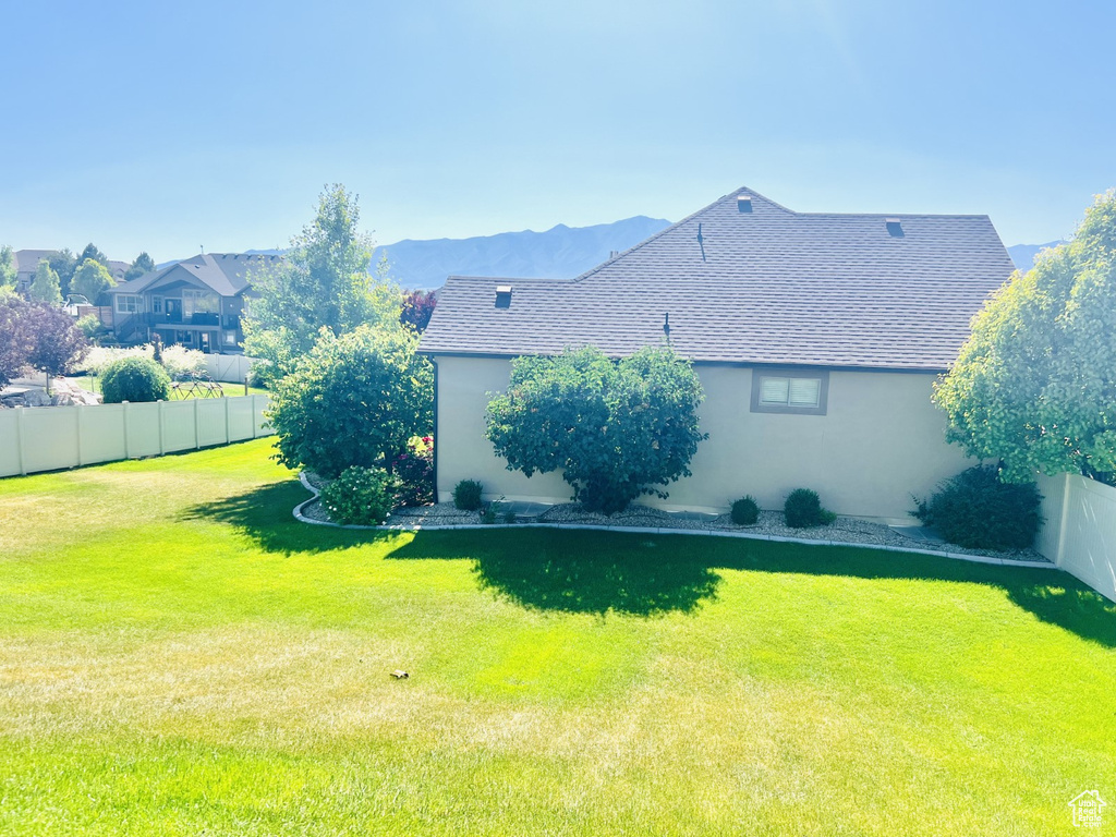 View of fenced backyard