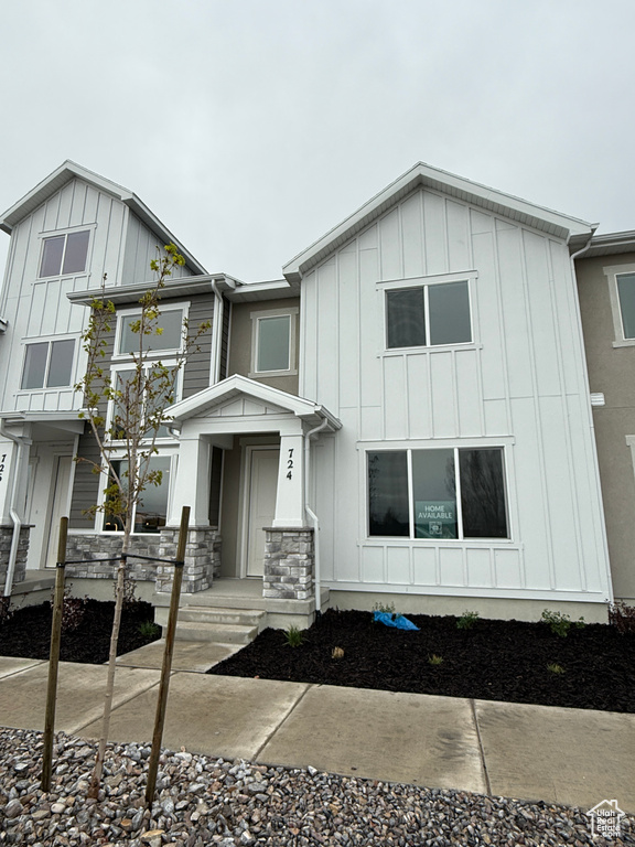 View of front of property featuring board and batten siding