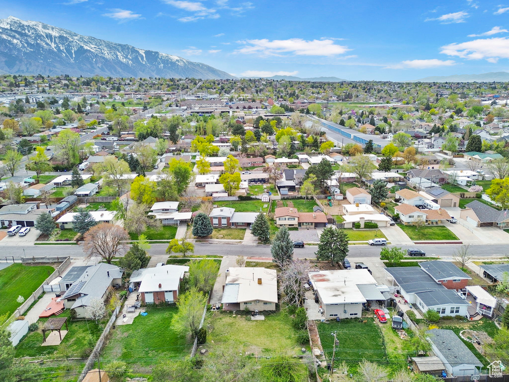 Birds eye view of property featuring a mountain view and a residential view
