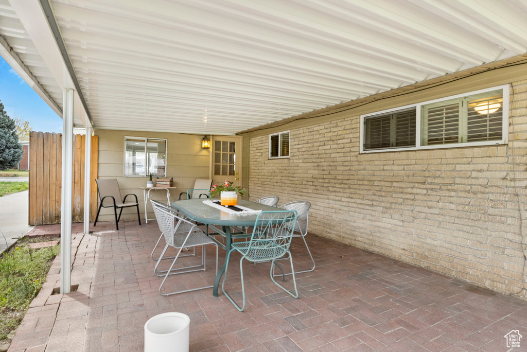View of patio with outdoor dining space