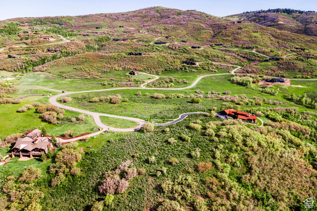 Aerial view of property's location with mountains