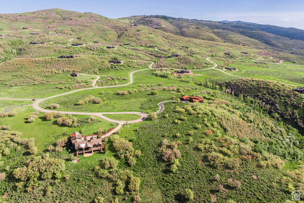 Aerial overview of property's location featuring mountains