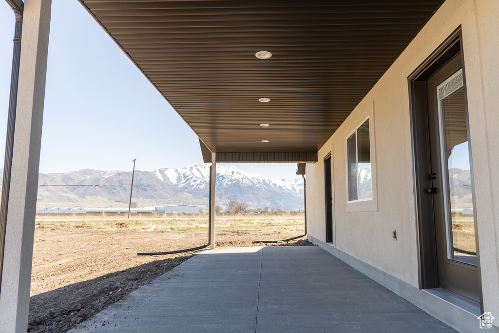 View of patio / terrace featuring a mountain view