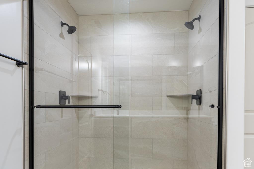 Full bathroom with a stall shower