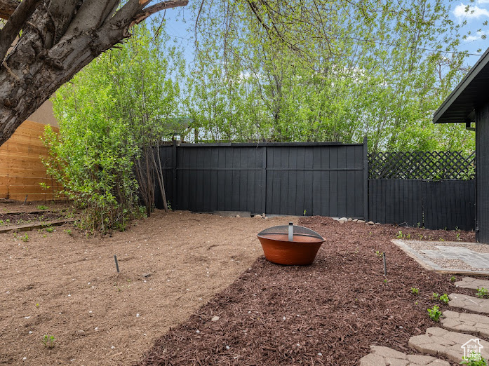 View of yard with fence