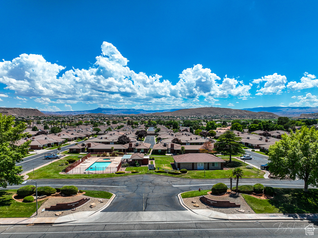 Birds eye view of property featuring a mountain view and a residential view