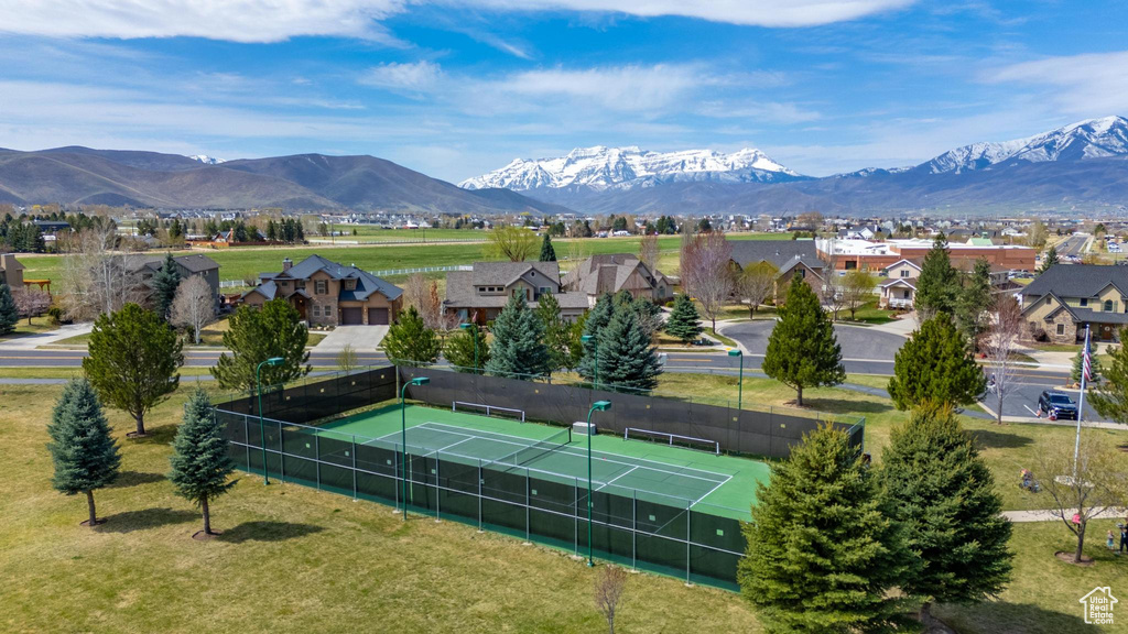 Drone / aerial view featuring a mountain view and a residential view