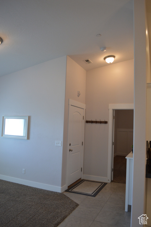 Entryway with visible vents and baseboards