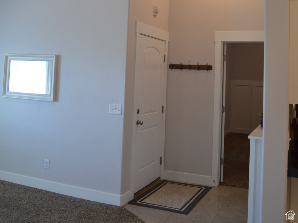 Entryway with visible vents and baseboards