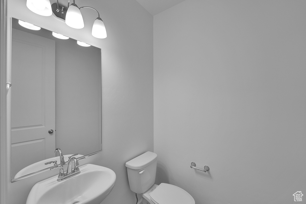 Bathroom with a sink and toilet