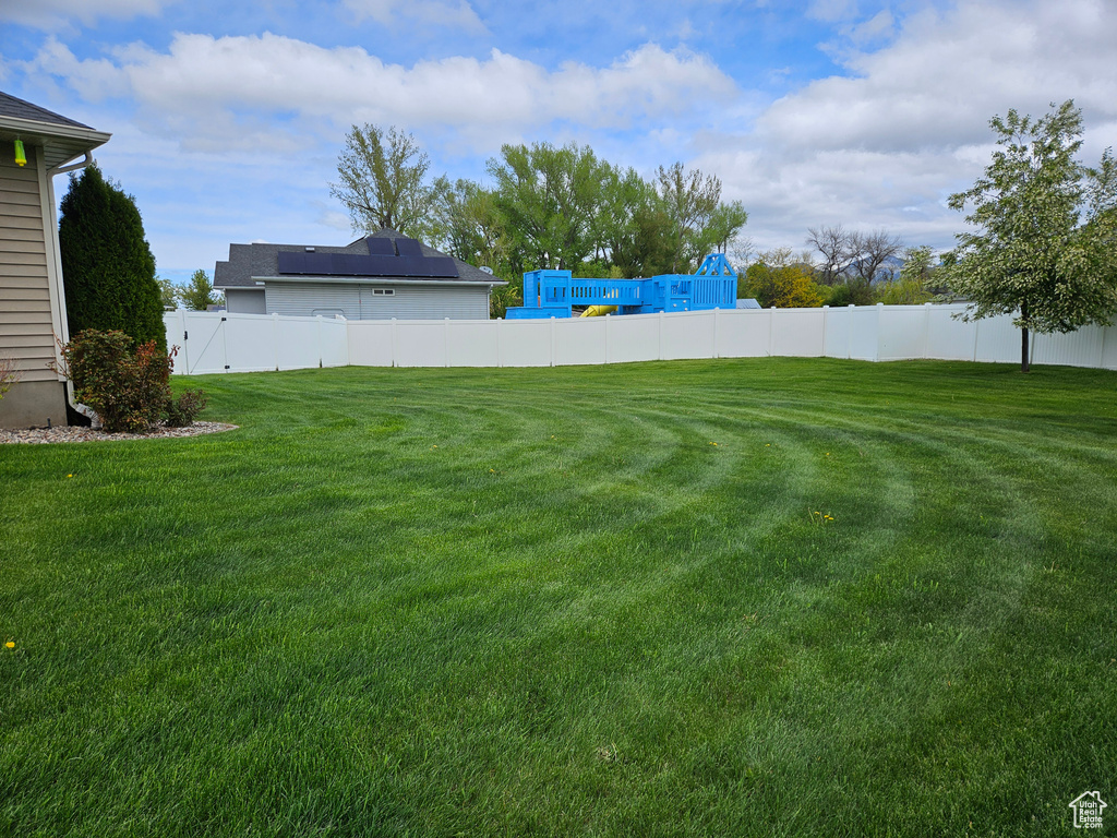 View of yard with fence