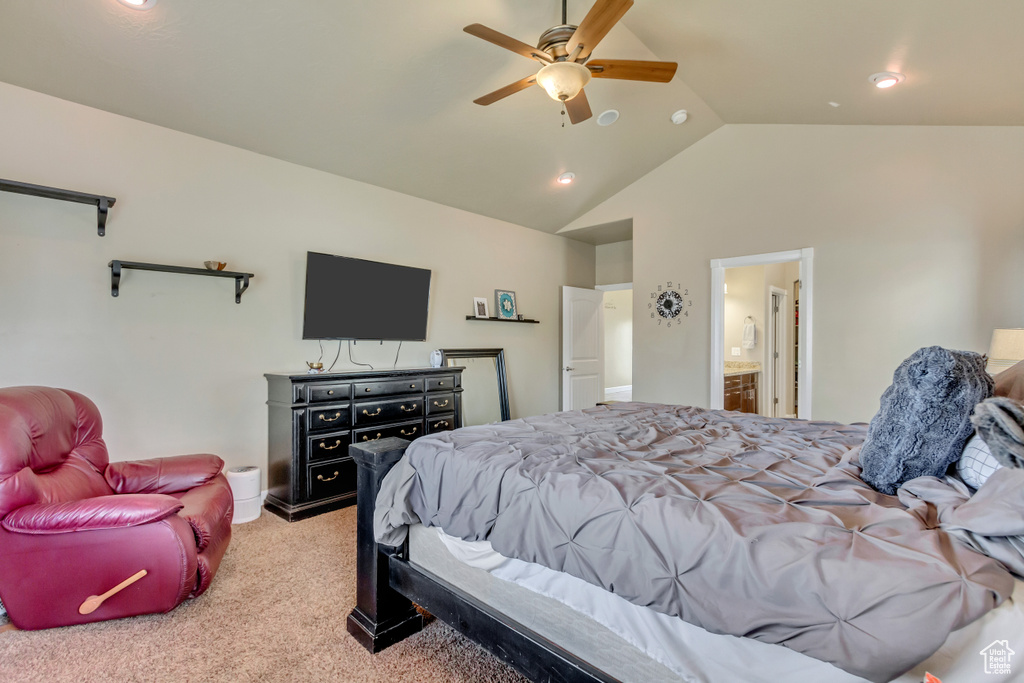 Bedroom featuring high vaulted ceiling, ceiling fan, light carpet, ensuite bath, and recessed lighting