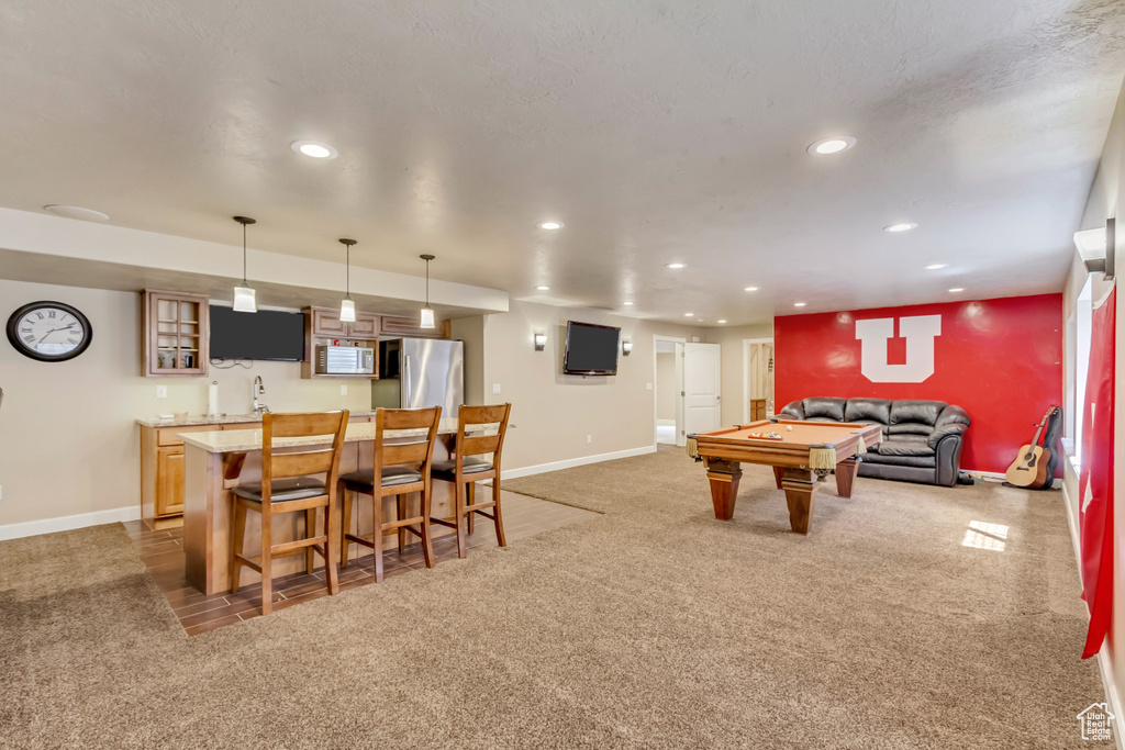 Rec room with light carpet, wet bar, baseboards, recessed lighting, and billiards