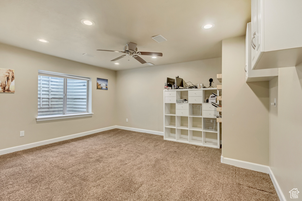 Empty room with recessed lighting, carpet flooring, a ceiling fan, and baseboards
