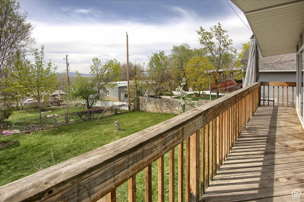 Wooden terrace with a yard