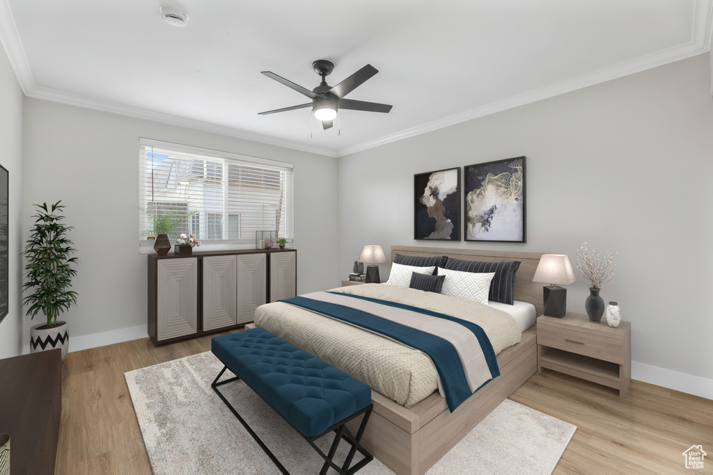 Bedroom featuring crown molding, light wood-style flooring, baseboards, and ceiling fan
