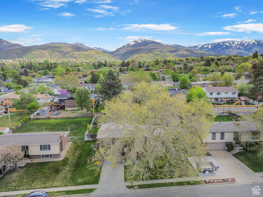 Drone / aerial view featuring a residential view and a mountain view