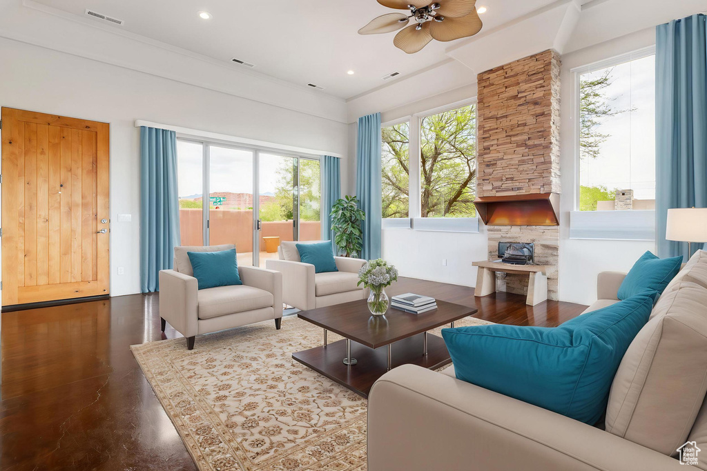 Living area featuring visible vents, a ceiling fan, concrete flooring, and recessed lighting