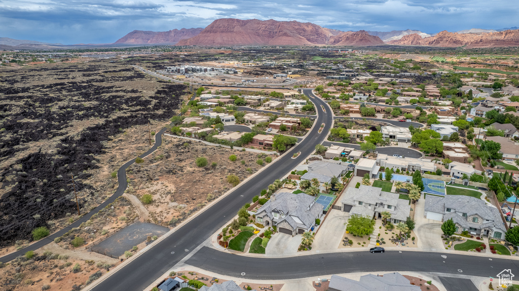 Drone / aerial view with a mountain view and a residential view