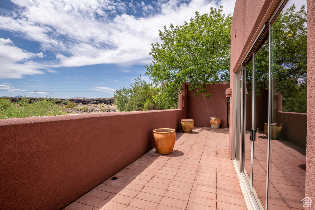 View of patio / terrace with a balcony