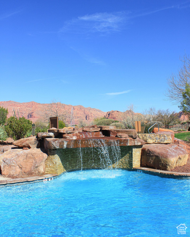 Outdoor pool with a mountain view