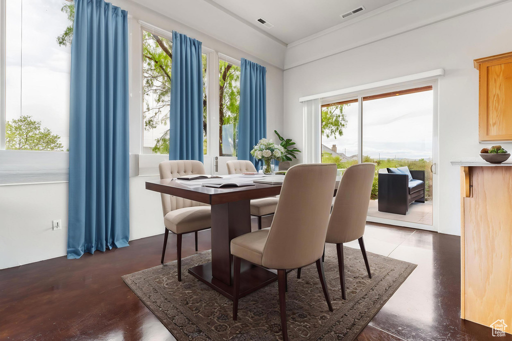 Dining room featuring visible vents