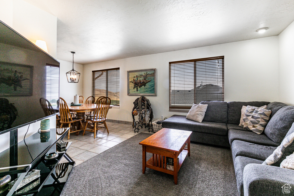 Living room with light tile patterned floors