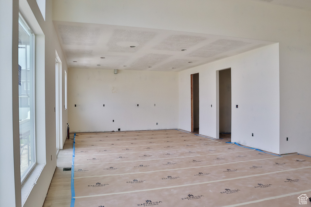Empty room with light wood-style floors