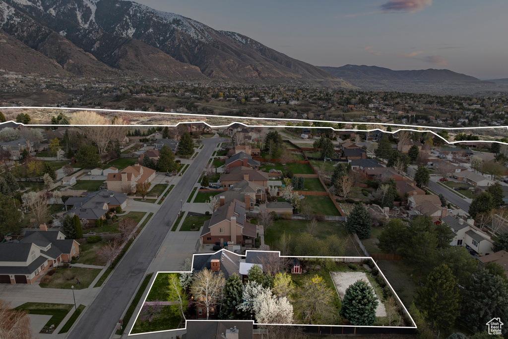 Aerial view featuring a mountain view and a residential view