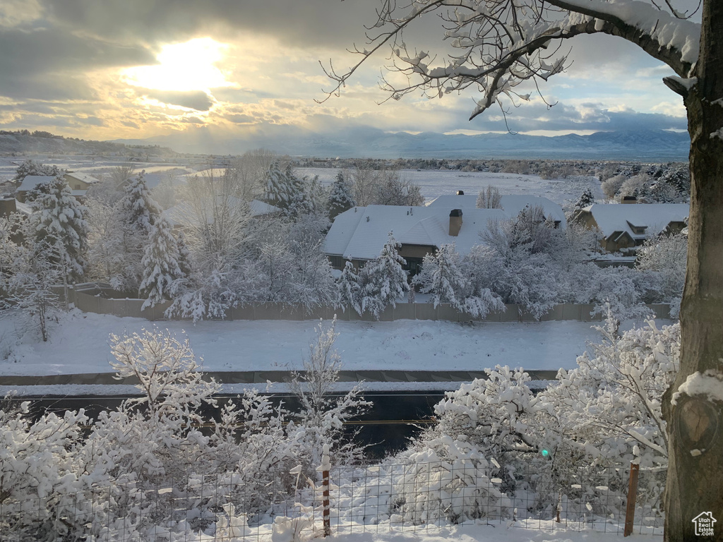 Snowy aerial view with a mountain view