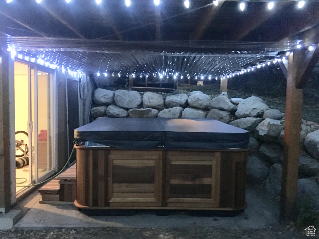Exterior space with a jacuzzi