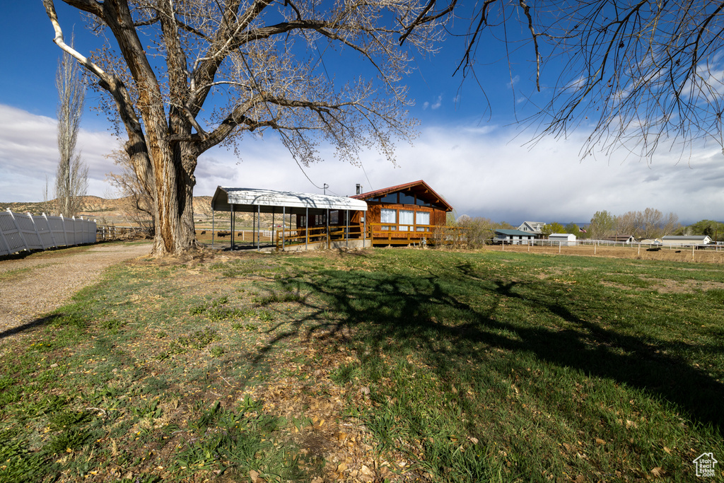 View of yard with fence