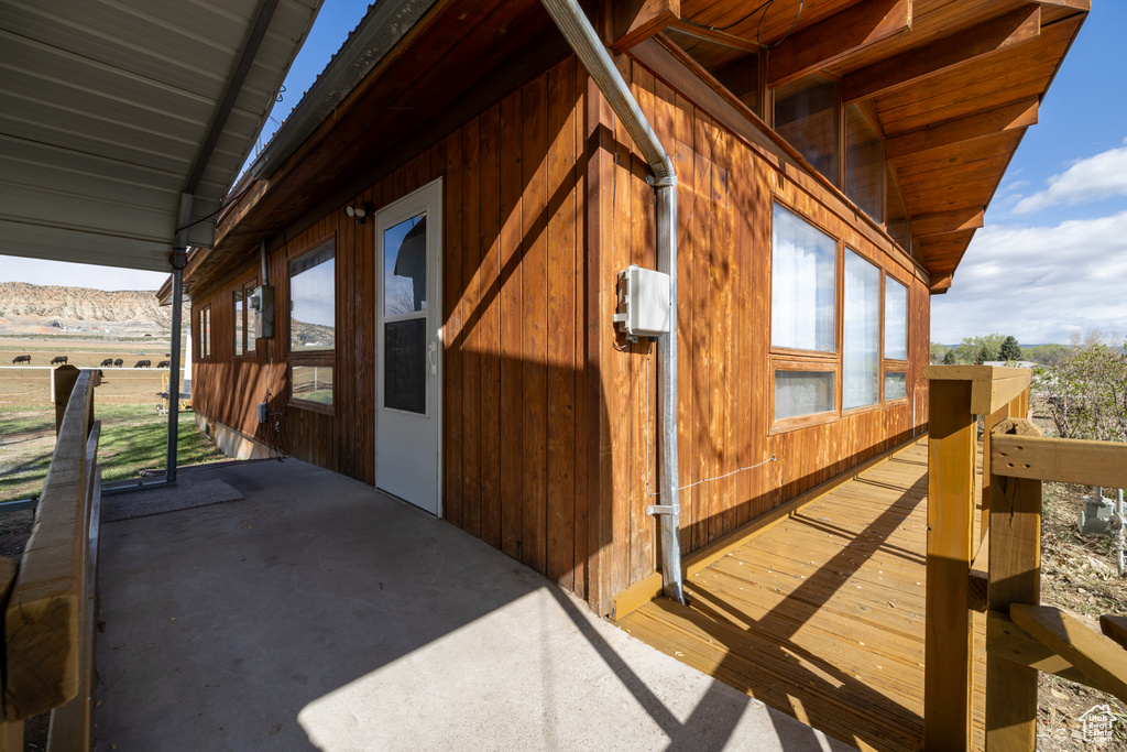View of property exterior featuring a mountain view