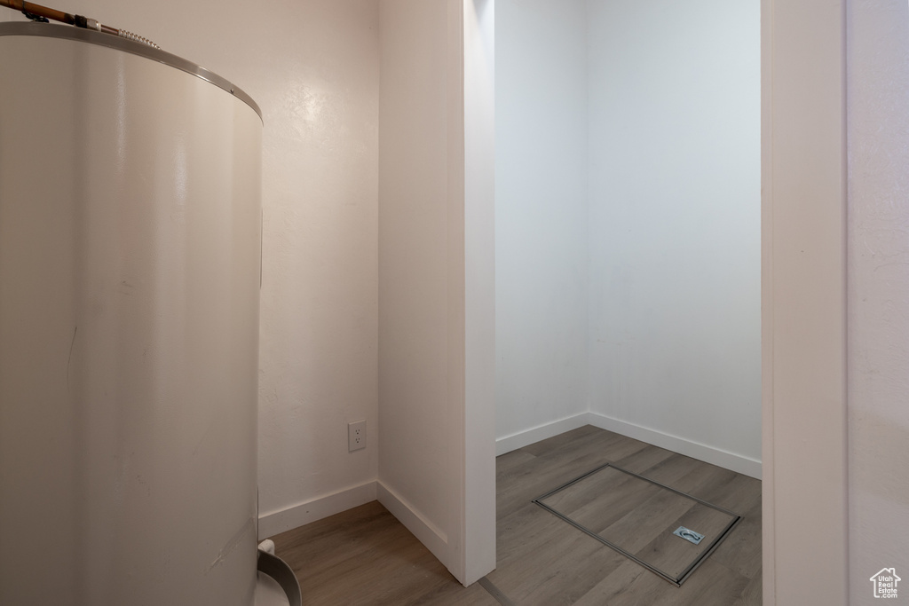 Bathroom featuring baseboards and wood finished floors