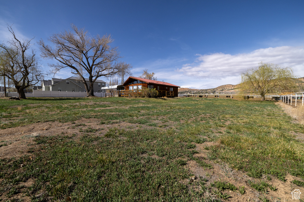 View of yard with fence
