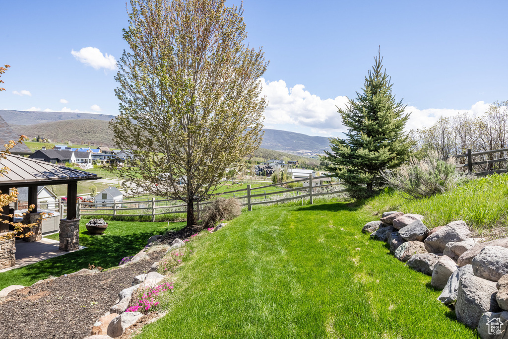 View of yard featuring a gazebo and a mountain view