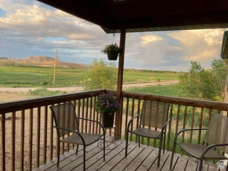 Wooden deck with a view of rural / pastoral area