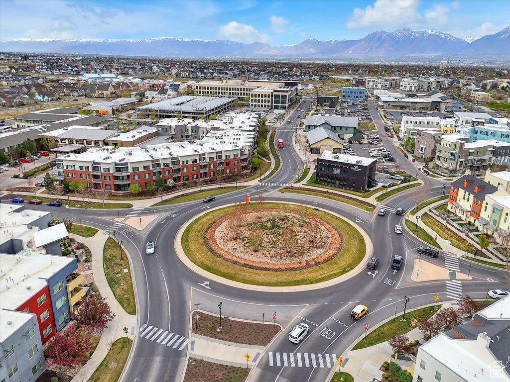 Birds eye view of property with a mountain view