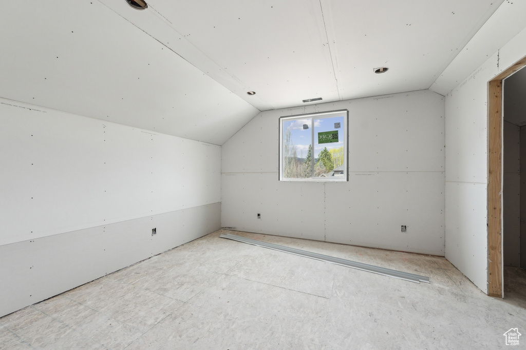 Bonus room with vaulted ceiling and visible vents