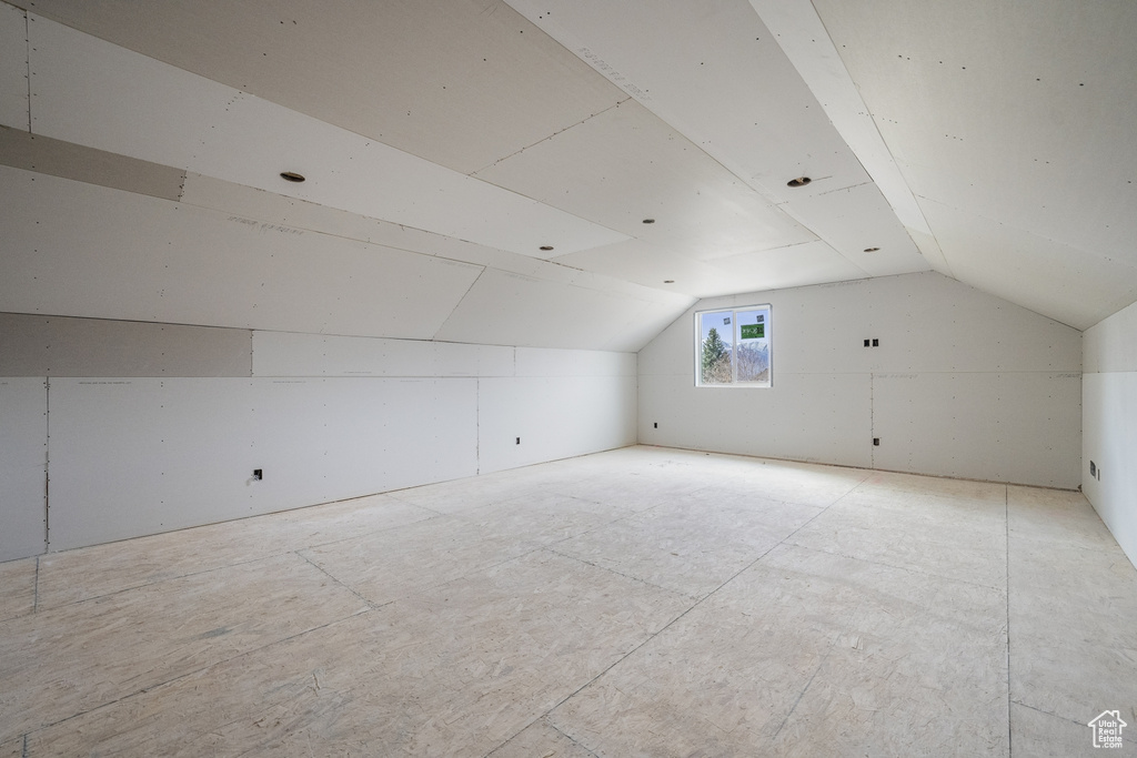 Bonus room featuring lofted ceiling