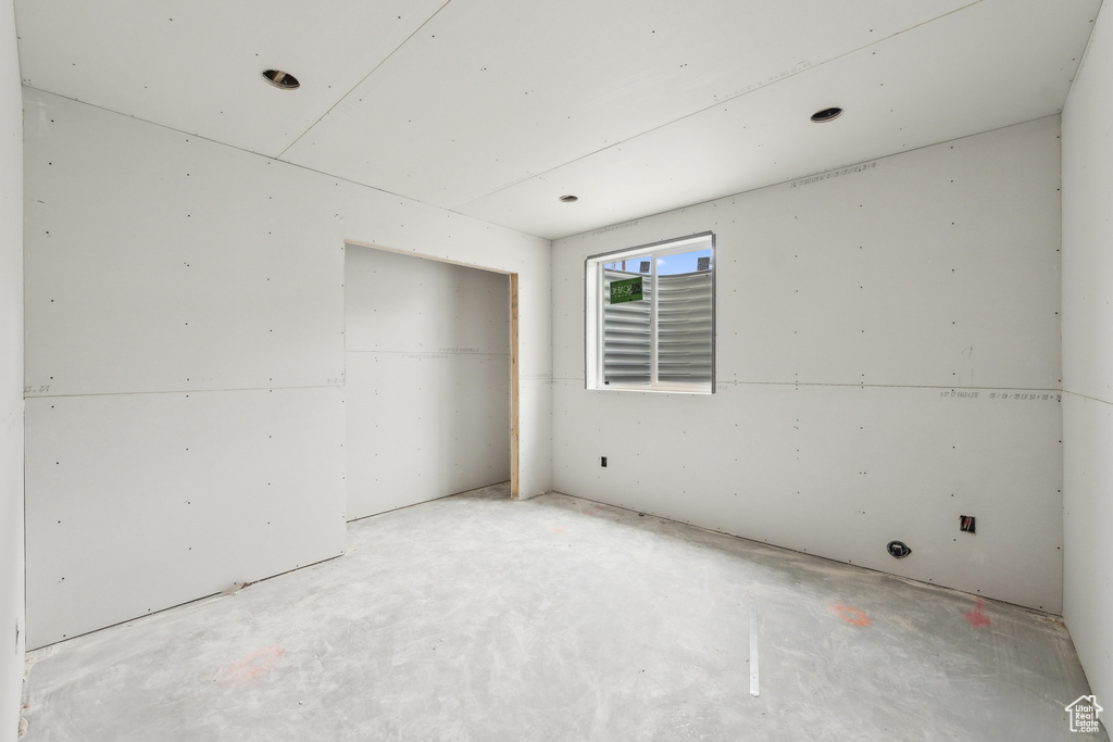 Interior space with concrete floors and a closet