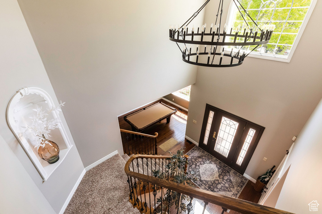 Foyer with a high ceiling and a chandelier