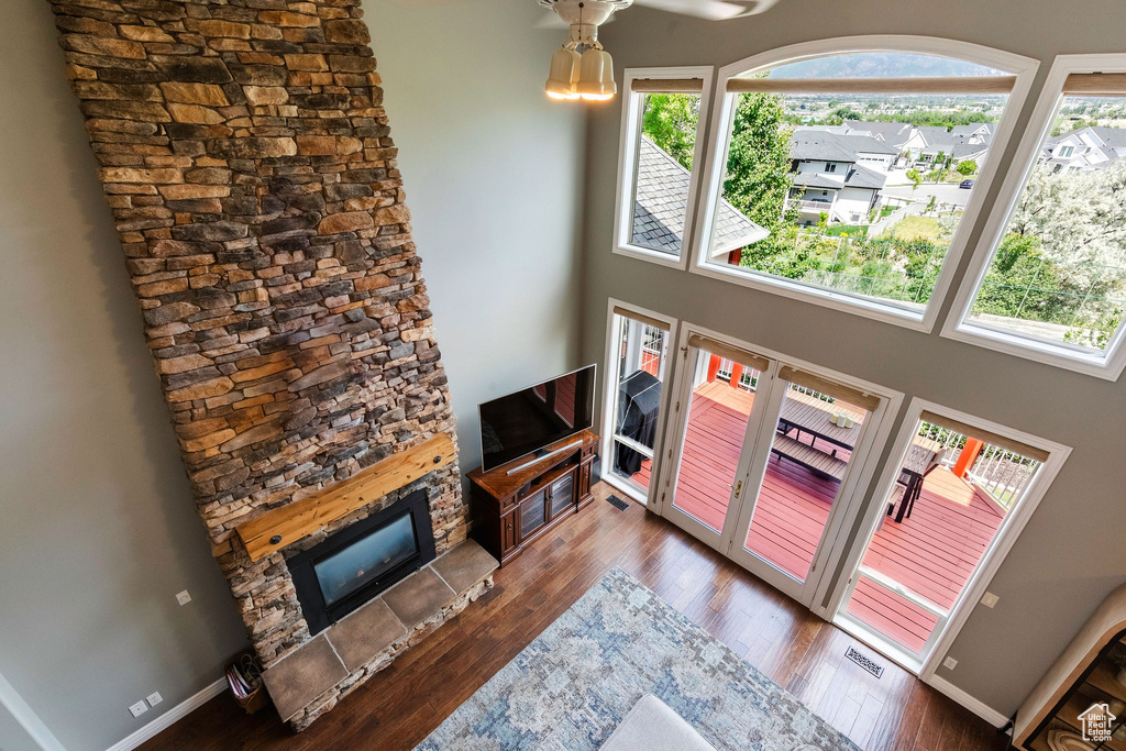 Living room featuring wood finished floors and a fireplace