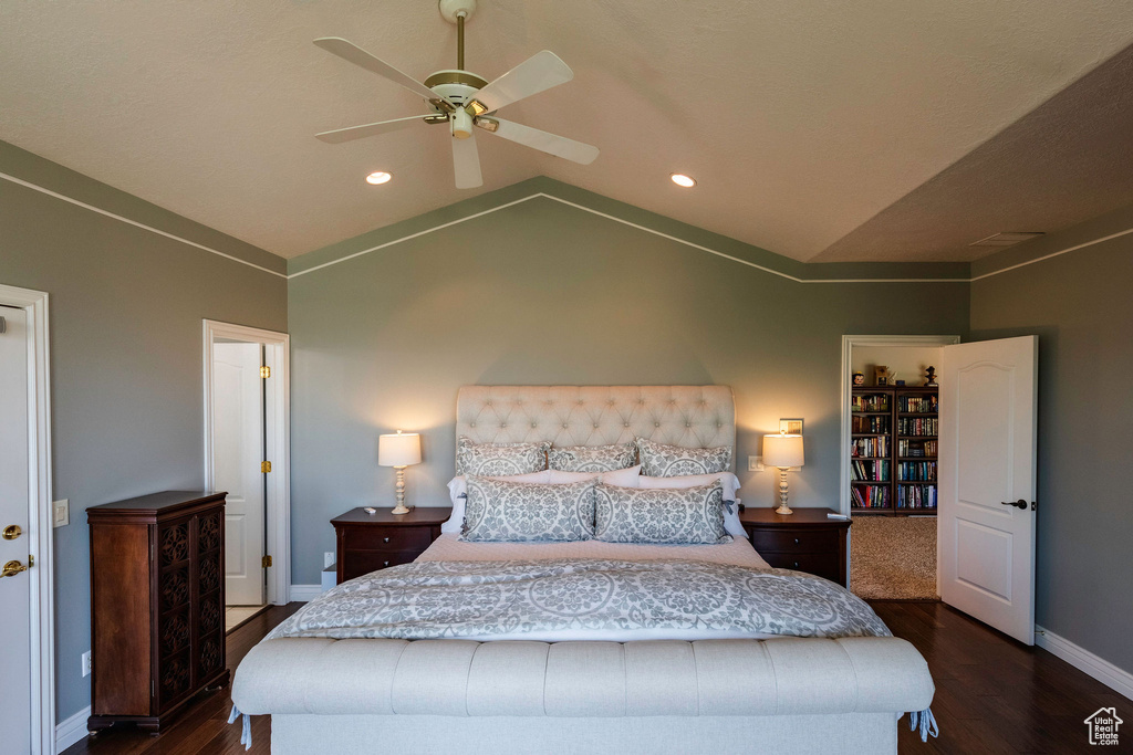 Bedroom with wood finished floors, vaulted ceiling, recessed lighting, and ceiling fan