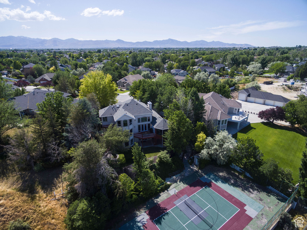 Aerial view of residential area with a mountain backdrop