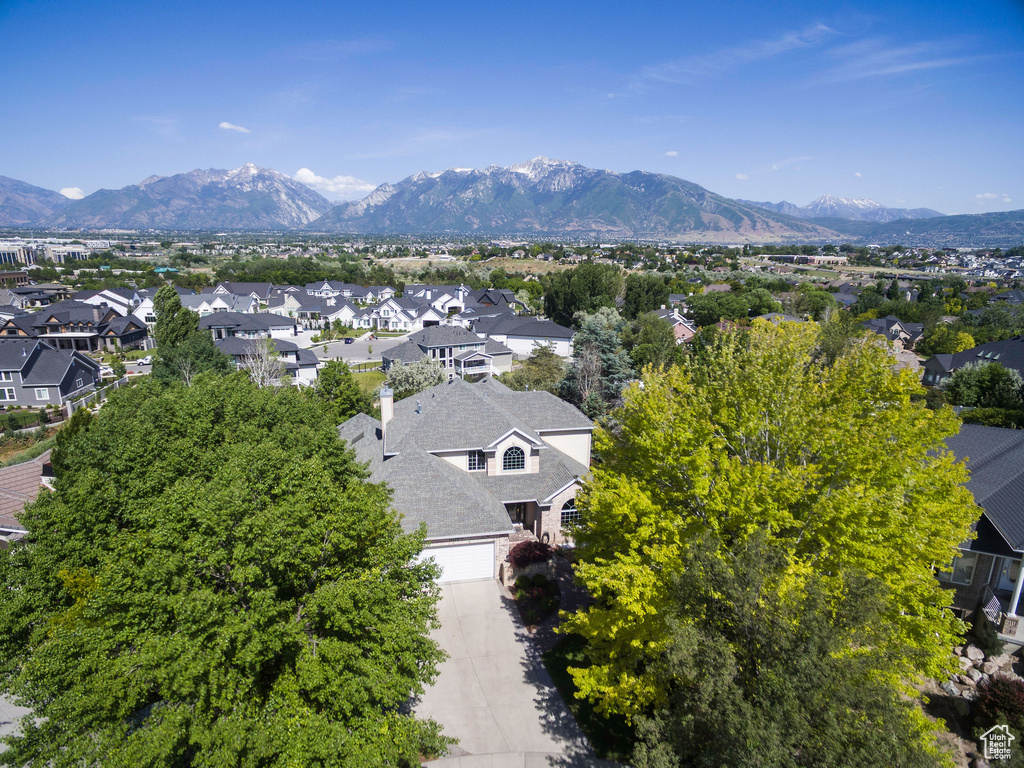 Aerial view of residential area with mountains